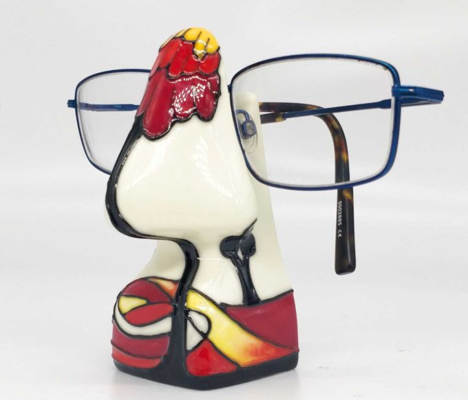 red and white nose glasses stand