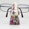 Glasses Stand made from ceramics and tubelined with purple flower pattern - nose shaped