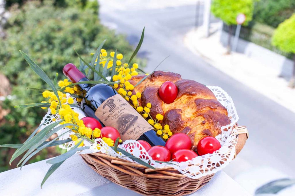 dine and wine granny with a delicious gift of exotic fruit, cheese, flowers in a hamper